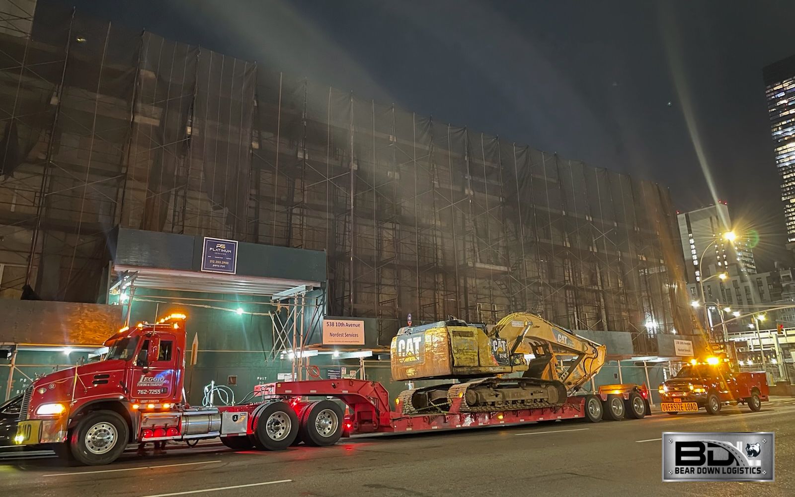 Industrial manufacturing machinery being prepared for plant relocation transport