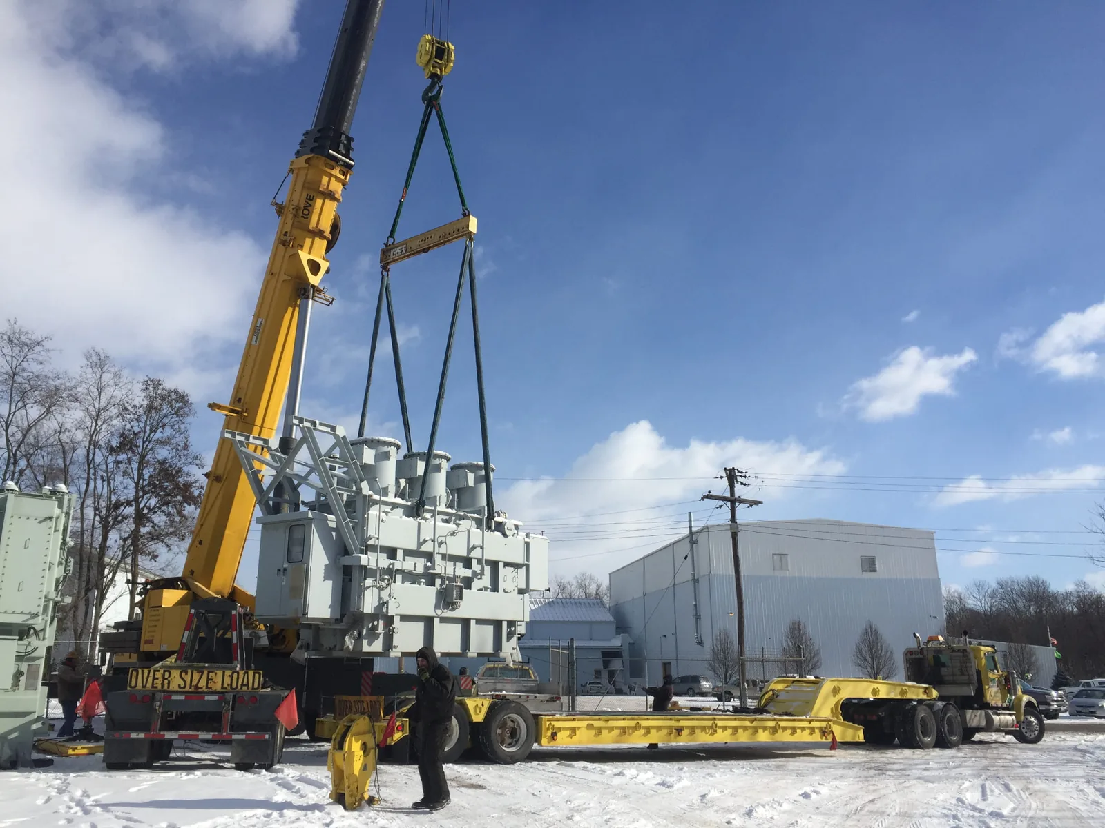 Substation transformer staged for heavy haul transport at a power utility site