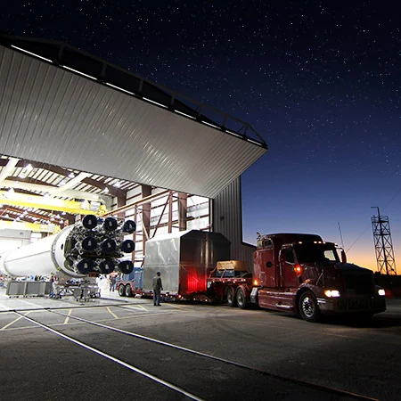 Oversized aerospace component prepared for specialized escorted transport